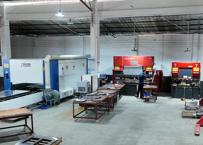 Laser cutting and CNC press brake machines in the Tarzan Kitchen sheet metal production workshop