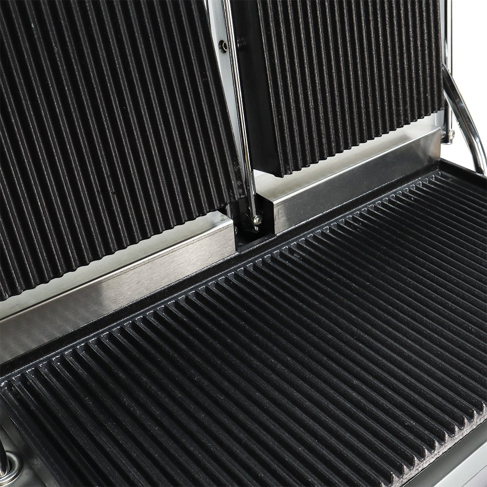 Close-up view of heavy-duty enamelled cast iron grooved upper and lower grill plates