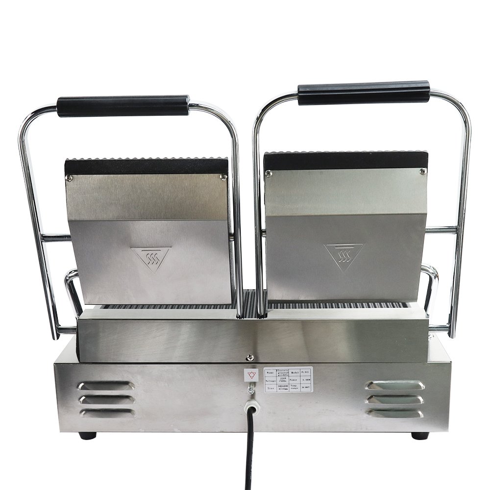Rear view of double panini grill showing stainless cooling louvers and grounding terminal