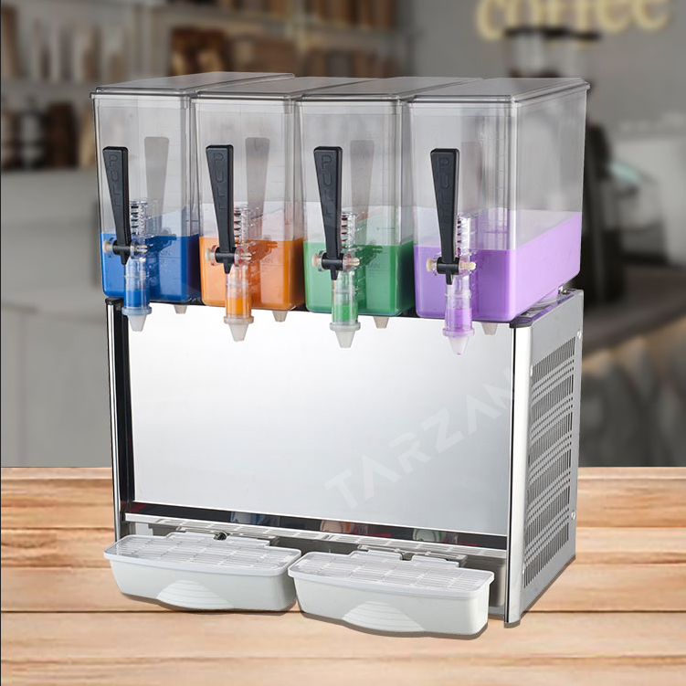 4-bowl commercial electric juice dispenser filled with colorful fruit drinks on wooden counter