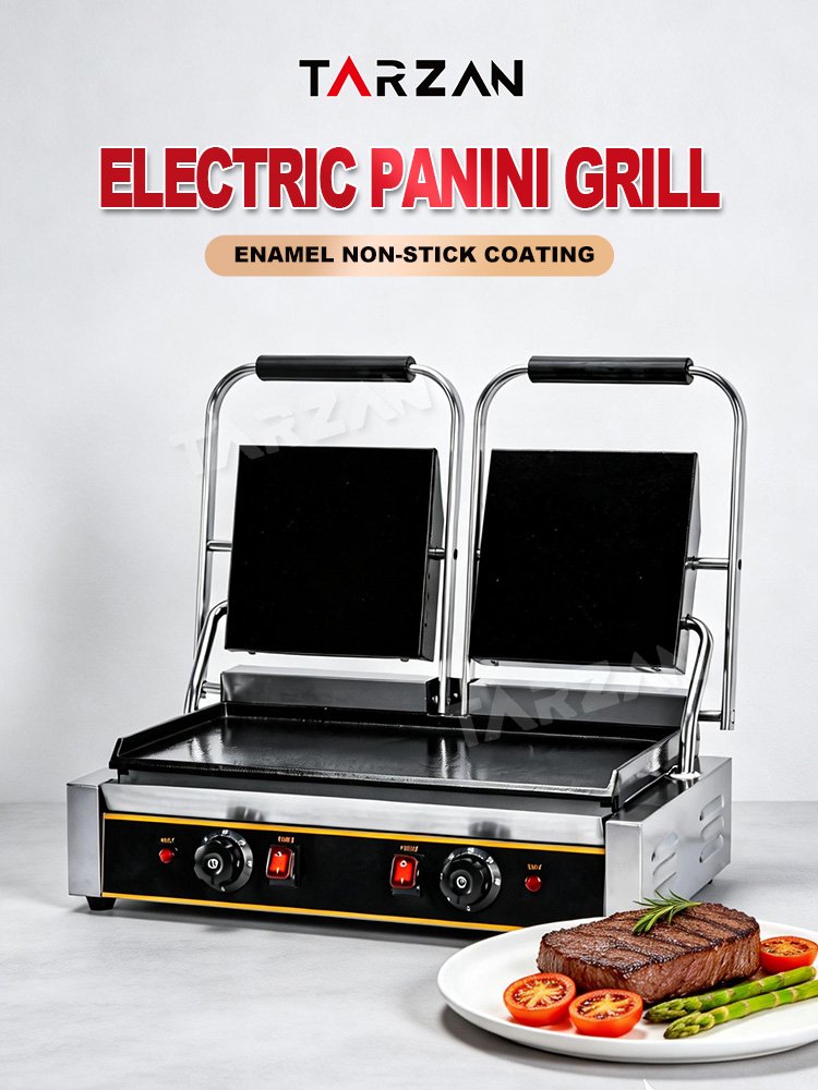 Commercial electric double flat panini grill on kitchen counter toasting steaks and snacks