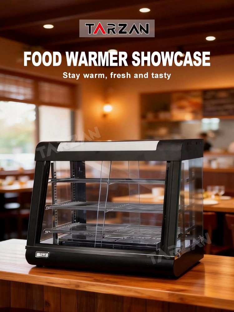Commercial heated food display cabinet illuminated on restaurant counter holding warm snacks
