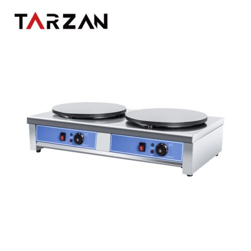 Double-Plate Electric Commercial Crepe Maker, model TCM-2E, shown with two round cast cooking plates with independent electric controls; 6 kW; 900 × 540 × 230 mm.