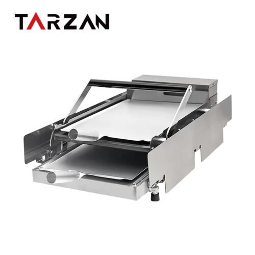 Commercial patty machine THM-212 with a stainless steel countertop frame, pressing section and short product conveyor on a white background.